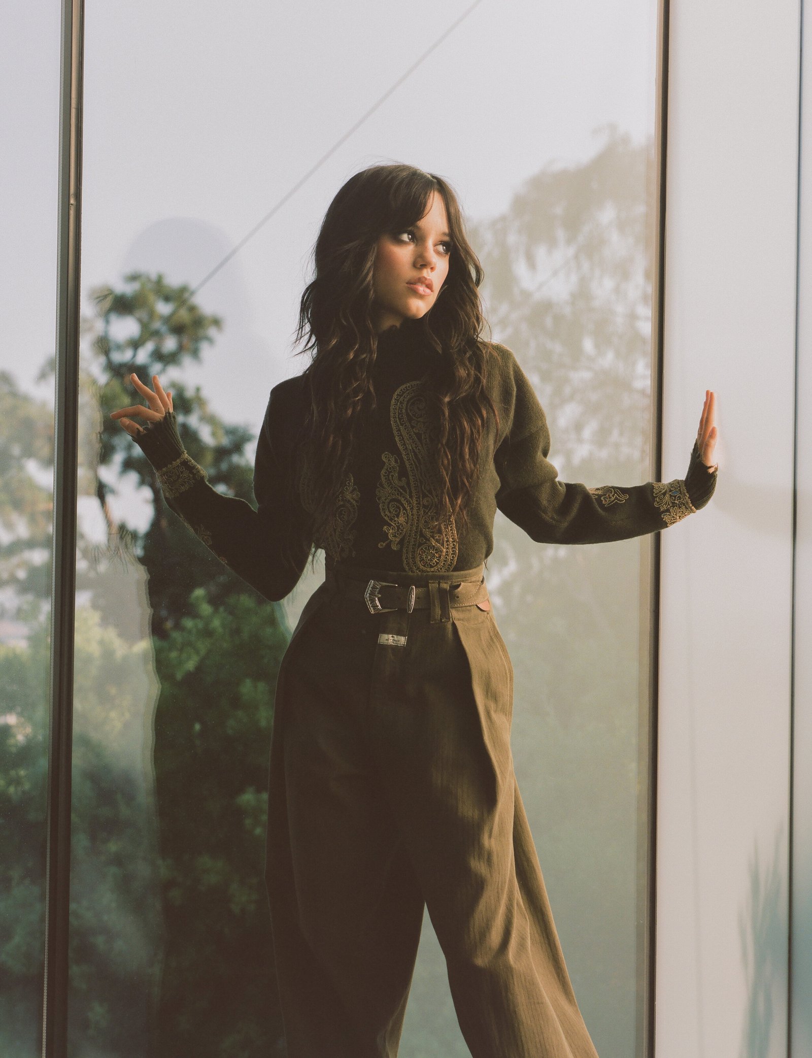 Jenna Ortega in a dark green suit Jenna Ortega in a dark green suit